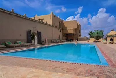 Image de Maison dans riad traditionnel avec piscine dans propriété de 21 ha de verdure