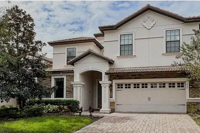 Image de Newly Renovated 8br Villa in ChampionsGate w/Pool/Spa, Game Room, Movie Theater,
