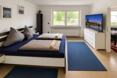 Image de Homefeld Holiday apartment Stadtmitte HĂĽnfeld