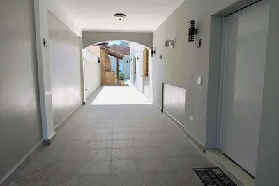 Image de Smart house with 5 suites | 2 blocks from Enseada beach