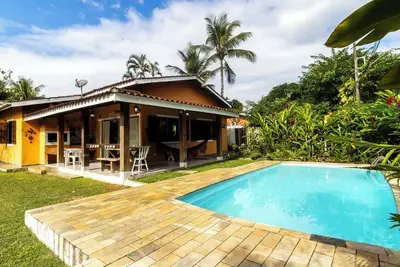 Image de Casa com piscina a 500m da Praia de Boiçucanga