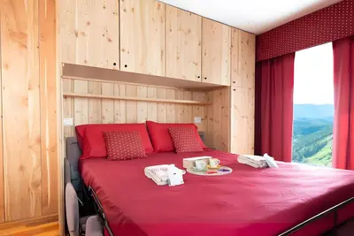 Image de Appartement \"Cupido\" avec vue sur les montagnes, balcon et Wi-Fi