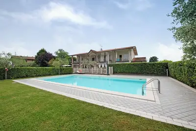 Image de Appartement \"Casa Delle Rondini\" avec vue sur les montagnes, piscine partagée et Wi-Fi