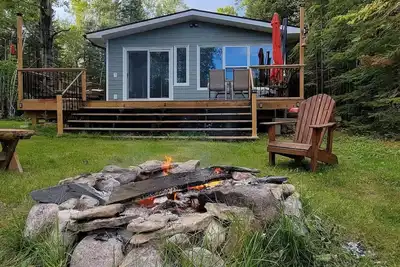 Image de Lakefront Cabin w/ Private Beach, Deck, Veranda & Full Kitchen – Pet Friendly