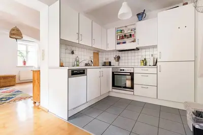 Central, quiet oasis with garden and parking lot