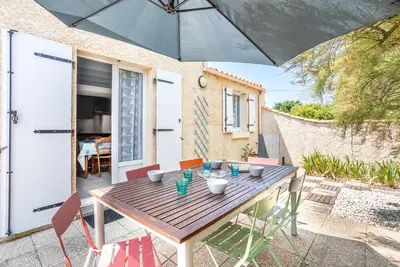 Image de Maison de vacances 'Maison De Vacances Avec Jardin' avec terrasse privée et jardin privé