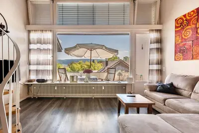 Image de Appartement 'Seesucht' avec vue sur le lac, balcon et Wi-Fi