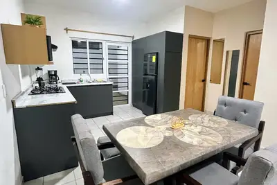 Image de Air-conditioned house, electric gate, covered garage, lovingly decorated.