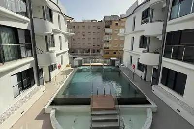 Image de Luxury one bedroom apartment with pool, with sea view in Estepona town centre.