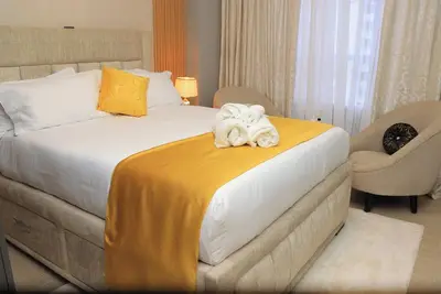 Image de Hughesy Haven. \nCozy apartment in Nairobi with WiFi, fitness room and pool