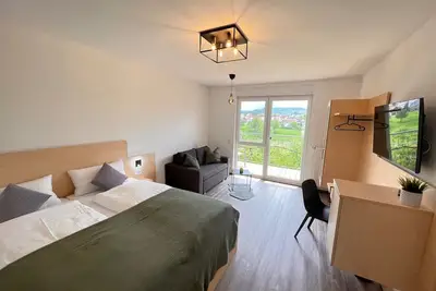 Image de Comfort apartment 1 - Guesthouse Zum Wolffenturm