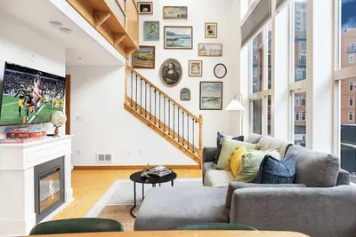 Image de Historic Dt Loft w/ 16ft Ceilings, Garage &97 Ws!