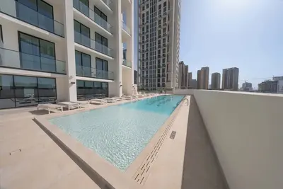 Luxury 1-Bedroom Jvc Apartment with Balcony & Pool