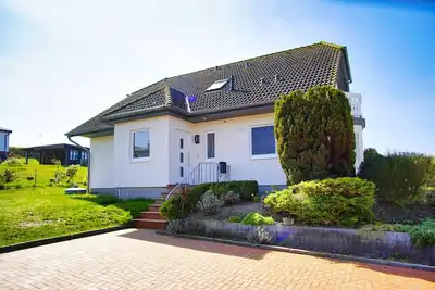 Image de Vacation apartment with balcony in a quiet location - Haus SĂĽdperd FeWo Stranddistel