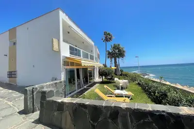 Image de Directly by the sea (1st row), close to 2 beaches, apartment in San Agustin