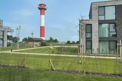 Image de In the Küstenleuchten vacation apartment, you live right by the sea - with pr