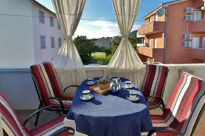 Image de Appartement de deux chambres avec le balcon Barbat, Rab (A-24547-b)