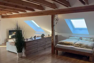 Image de Attic suite with living room/bedroom