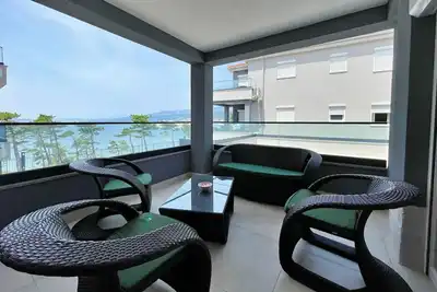 Image de Luxury Apartment Punta Silo - 30 m from the sea, sea view, swimming pool, outdoor shower, Smart Tv, laundry room, private parking