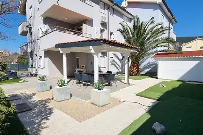 Image de Apartment Osmanovic A6 - with private Garden