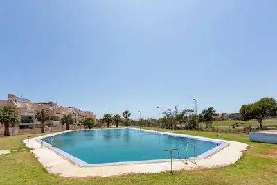 Image de Appartement 'Campo De Golf, Piscina Y Padel' avec vue sur la mer, piscine partagée et climatisation