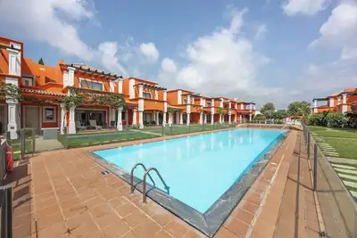 Image de Maison de vacances 'Orange Lux Tavira Residence 3i' avec piscine partagée, Wi-Fi et climatisation