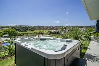 Image de Fabuleux appartement avec jardin privé et jacuzzi.