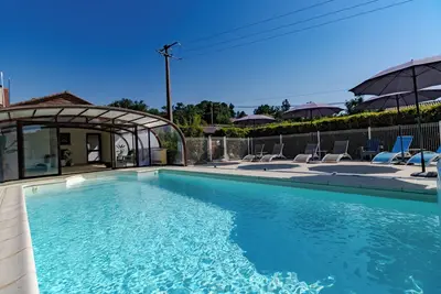 Image de Maison de vacances 'Liz' avec piscine partagée, Wi-Fi et climatisation