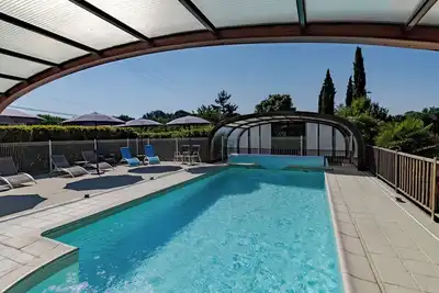 Image de Maison de vacances 'Rose' avec piscine partagée, Wi-Fi et climatisation