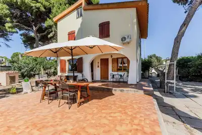 Image de Villa Etnic Eloise just steps from Porto Pino long beach
