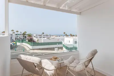 Image de Maison de vacances 'Casa Ancla' avec vue sur la mer, terrasse privée et climatisation