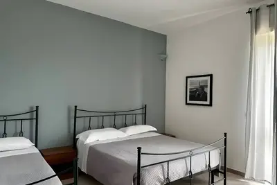 Image de Chambre 'Camelia 1' avec Terrasse partagée, Wi-Fi et Climatisation
