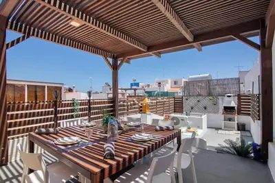 Image de Maison de vacances 'Fuzeta' avec terrasse privée, Wi-Fi et climatisation