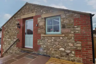 Image de The Hayloft, pet friendly, with a garden in Brompton-On-Swale