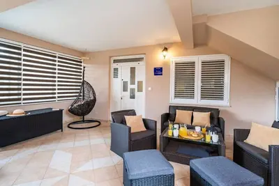 Image de Appartement avec 3 chambres et jacuzzi