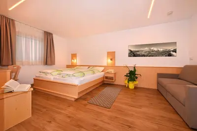 Image de Appartement 'Edelweiß' avec vue sur les montagnes, jardin partagé et Wi-Fi
