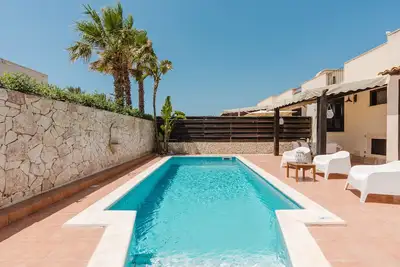 Image de Villa 'Il Canto delle Onde' avec piscine, vue sur la mer, Wi-Fi et climatisation