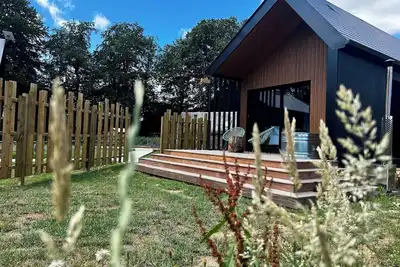 Image de Le Frêne, lodge en bois avec bain nordique privatif