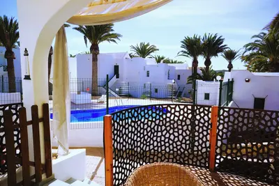 Image de Charming bungalow in the palms at the pool in delightful Costa Calma with WiFi
