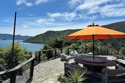 Stunning sea views  from every room, an art  filled retreat & drive on access