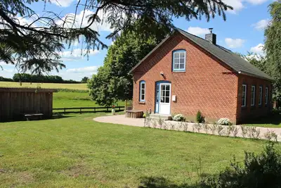 Image de Vacation home with garden and terrace in a quiet location, Baltic Sea 3 km away.