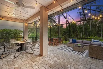 Image de Noc Nest Family Retreat - Screened Lanai - Fire table - Outdoor Bbq - Game Room