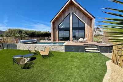 Image de Villa Des Sables Blancs•Piscine extérieure chauffée à 29°C•Vue sur la baie