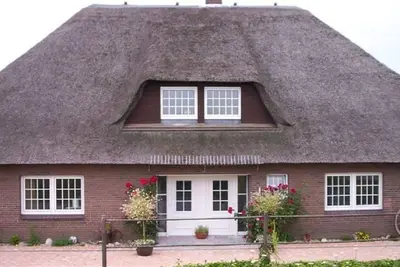 Image de Ebb and flow - thatched roof house, garden, sauna