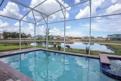 9-Bed Luxury Waterfront Villa w/ Pool & Game Room