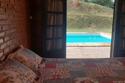 Image de Cozy suite with relaxing pool view surrounded by nature