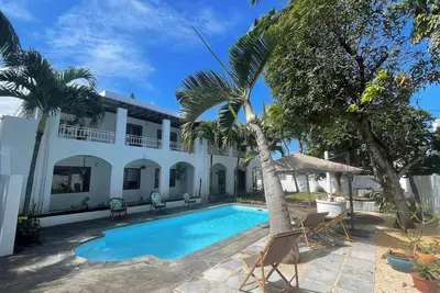 Image de Malcolm, appartement 4 chambres à quelques minutes à pieds du lagon de Blue Bay!