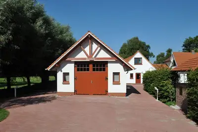 Image de Haus Sternenwelle for nature lovers on the water with a dream view of Fischland
