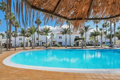 Image de Oasis Duna - Casa Amanay : appartement avec piscine partagée, terrasse privée et Wi-Fi