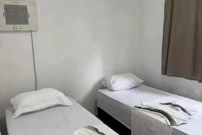 Image de ItapuĂŁ - 4 Minutes from the Beach - Bedroom with Suite - Two Bathrooms - Air Conditioning